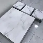 طاوله ارضيه مع ثلاثه خدمه