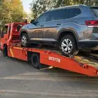 سطحة لنقل السيارات والمعدات