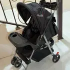 دراجة وكرسي سياره خاص بالأطفال