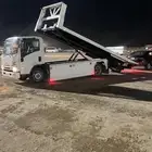 سطحه الخرج لنقل السيارات
