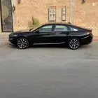 كيا K8 نص فل اسود داخلي اوف وايت بدي وكاله و عليها حمايه