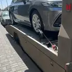 سطحه الريآض لنقل السيارات داخل وخارج الرياض