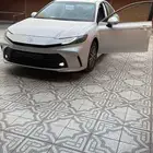 كامري 2025 ابيض ستاندر بنزين E