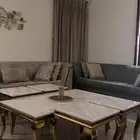 طاوله رخاميه فخمه مع اربع طاولات صغيره جانبيه