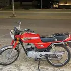 سوزوكي AX100