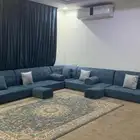 مجلس تحتوي على كنب م مع مراكي مع ستاره