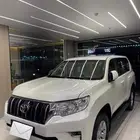 للبيع برادو TXL 2023 أبيض 6 سرندل (ممشى 1386 KM )وكاله نادر