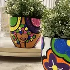 قوار فخار مرسوم للنباتات اشكال متعدده