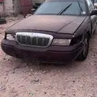 فورد ماركيز 98 2002 احمر غامق