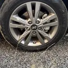 اربع جنوط سياره انترا واربع كفرات جدد للبيع