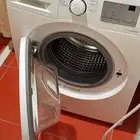 غسالة اتوماتيك وتنشيف