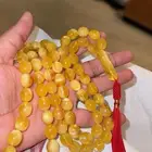 سبحة كهرمان راهي مع شهادة من مختبر دانات البحرين
