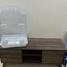 قفص طيور ودولاب تلفاز