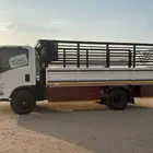 دينا لنقل الاثاث وسطحه لنقل السيارات