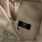فستان من مشاعل المهداوي سعر الشراء 1233 نظيف مره جميل