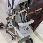 عربة أطفال بوجهين