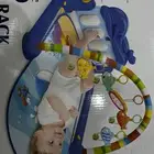 لعبة اطفال وجهاز موسيقيه للسرير