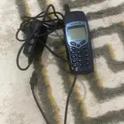 جوال اركسون شغال مع الشاحن للبيع
