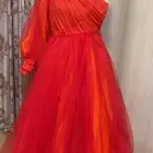 فستان ب اللون البرتقالي والأحمر مقاس S السعر 1300