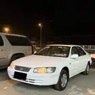 كامري 2001 فل كامل ابيض قير عايدي