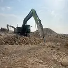 بوكلين حفر وترحيل