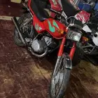 سزواكي AX100