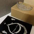 طقم للعرائس ( سلسال  حلق   سواره   خاتم )   تاج