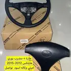 طارة مع المضرب اسود هايلكس 2012-2015 اصلي وكاله