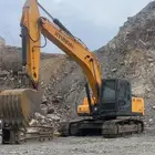 بوكلين لقص الأراضي وبنيان الحجر