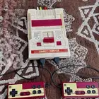 جهاز أتاري الأصلي مع وحدتين تحكم و زايد 9000لعبة