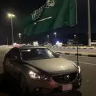 علم السعودية مع قاعدة شنكار للسيارات