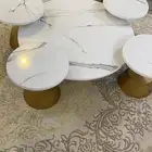 طاوله مكونه من 4صغار خدمة وحدة في النص كبيره