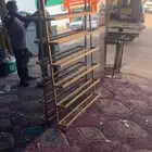 رفوف حديد للمشاغل