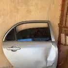 باب كورلا خلفي يمين يجي على موديل 2001الى2007 فيه طقه
