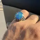 خاتم من الاوبال الاثيوبي طبيعي ع صياغه فضه