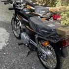 اكس 100 - AX100 احمر واسود ورصاصي وسلفر موديل 2026 يوجد تابي