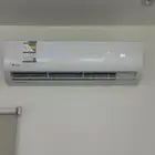 مكيف ماندو جديد بالكرتون طن ونص حار بارد