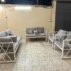 كراسي وطاولة خارجية