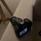 كاميرا كانون eos2000D Canon EOS 2000D بكامل أغراضها
