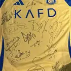 تيشيرت موقع من لاعبين النصر