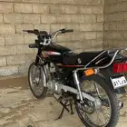 دباب سوزوكي ax100 الاصلي بلوحه