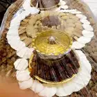 تجهيز صواني التمر والمضير والسمن