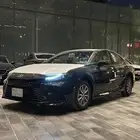 كامري اسود ستاندر هايبرد E Hev 2025