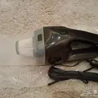 مكنسه كهربائيه للسياره