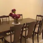 طاولة طعام مكونه من سبع كراسي استخدام نضيف