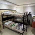 سرير حديد دورين مع مراتب ومفارش ومخدات وحامي وسلم