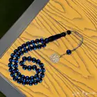 مسبحة لون مميز ( أسود شفافيتها زرقاء )