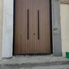 أبواب حديد كلادينج وطورائ ونوافذ الألومنيوم