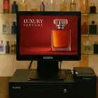 عرض جهاز كاشير لمس لمحلات العطور العربية