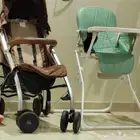للبيع كرسي طعام وعربة اطفال